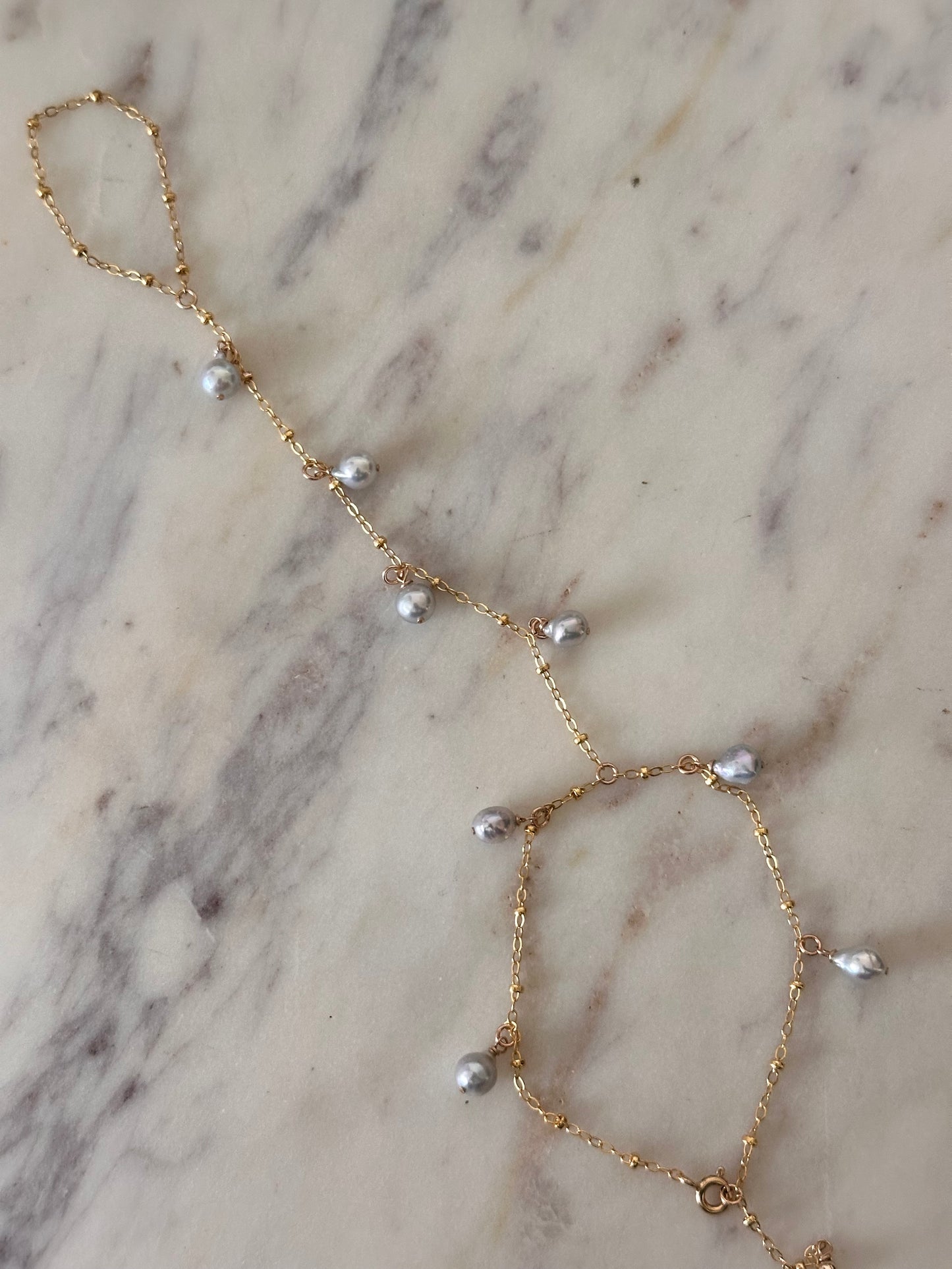 Blue Akoya Handchain